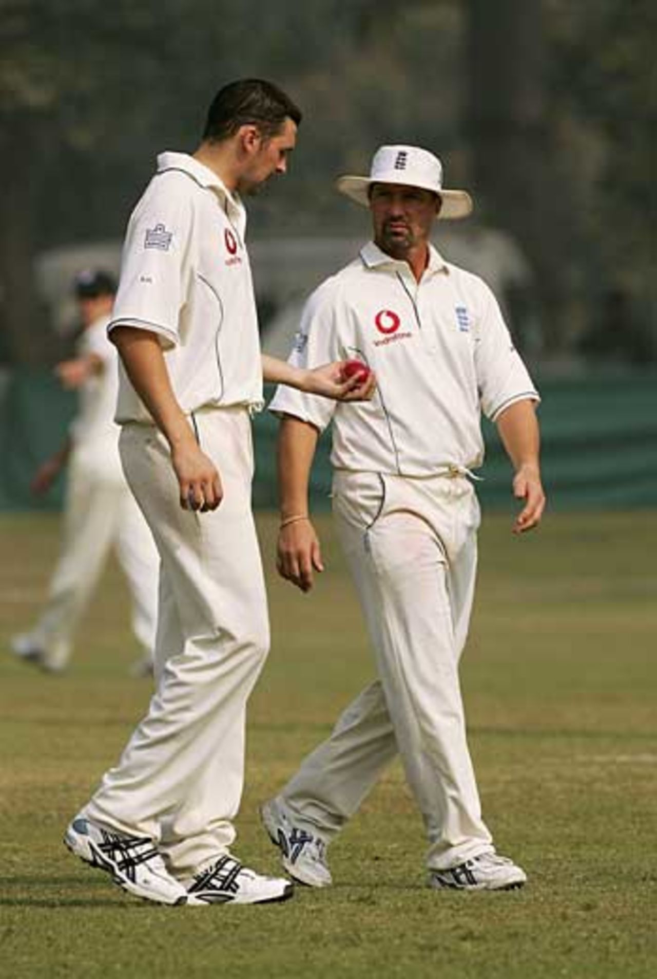Matthew Maynard, who was forced into action as a sub fielder, talks to Steve Harmison as England slip to defeat, Pakistan A v England XI, Tour Match, Lahore, November 8, 2005