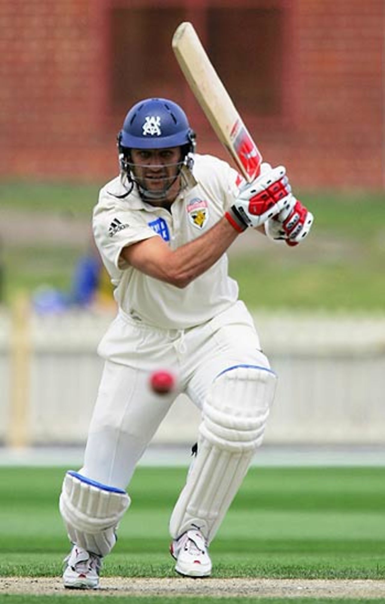 Jon Moss drives during his brief innings, Victoria v West Indians, Tour match, Junction Oval, Melbourne, November 12, 2005