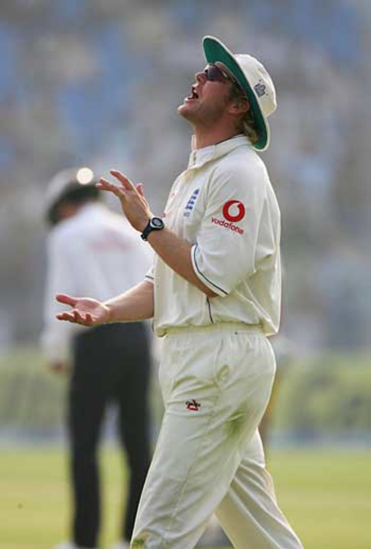 Matthew Hoggard applauds the efforts of Steve Harmison with England striving for wickets on the opening day, Pakistan v England, 1st Test, Multan, November 12, 2005