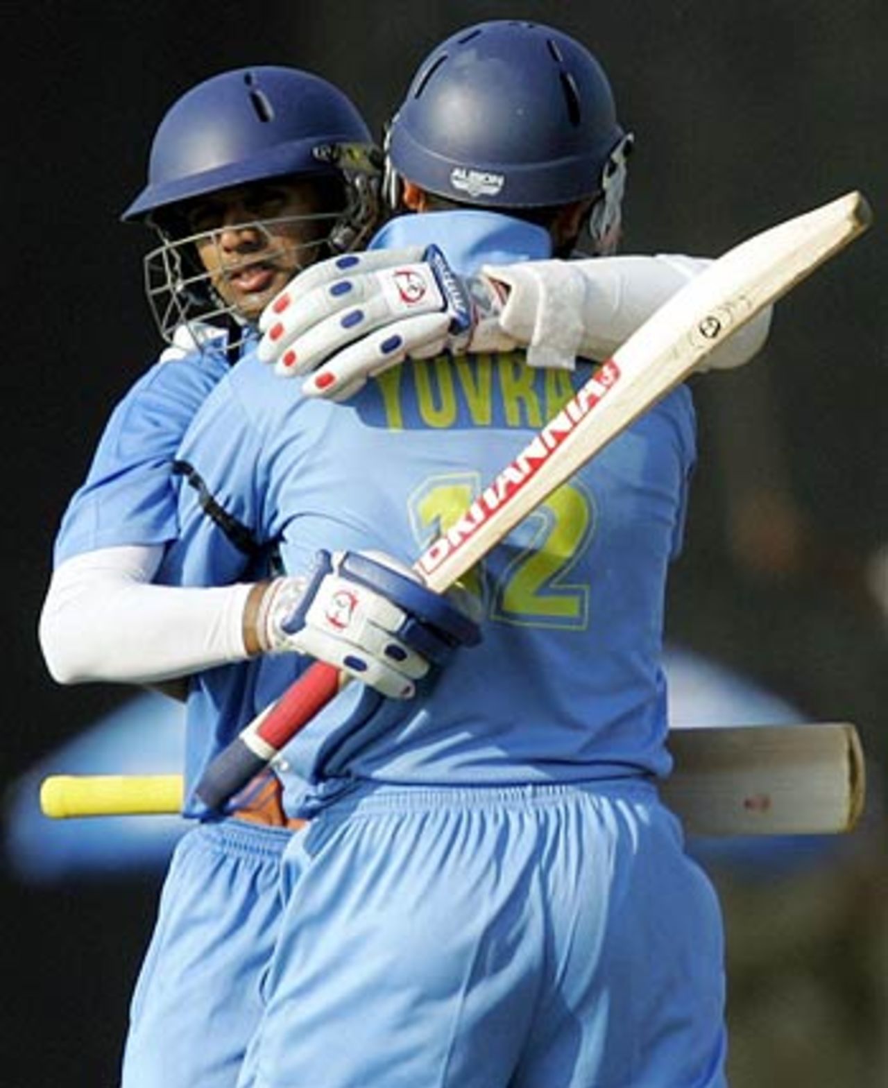 Rahul Dravid embraces Yuvraj Singh as India win the match, India v Sri Lanka, 7th ODI, Baroda, November 12, 2005