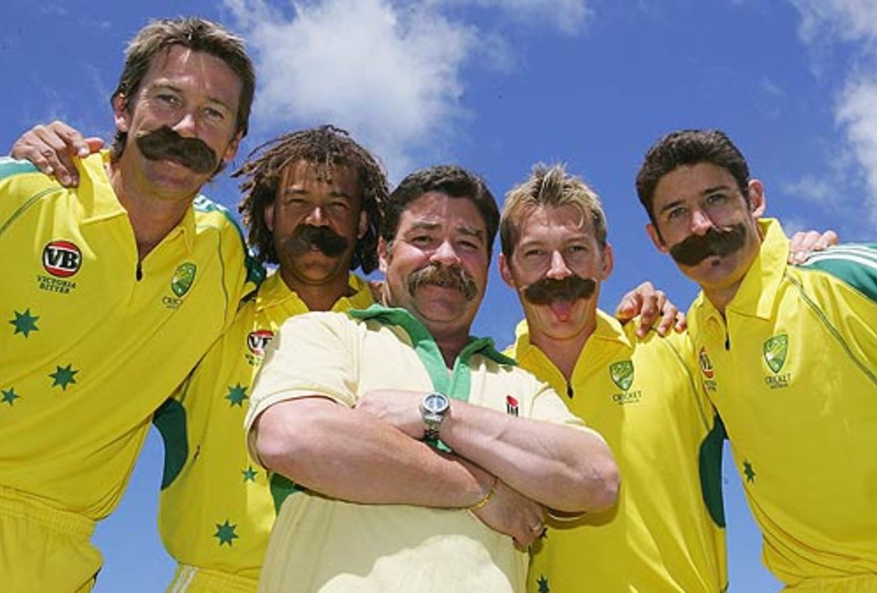 Glenn McGrath, Andrew Symonds, Brett Lee and Mike Hussey pose with David Boon wearing imitation "Boon" moustaches after training at Bellerive Oval, Hobart, November 15, 2005
