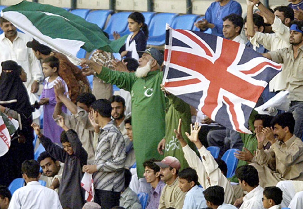 Who should I cheer? A fan waves both the Pakistan and England flags, Pakistan v England, 1st Test, Multan, November 15, 2005