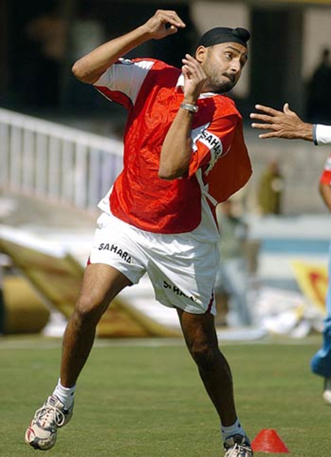 Harbhajan Singh mixes the <i>bhangra</i> with fielding drills during a practice session ahead of the 1st ODI against South Africa, Rajiv Gandhi International Stadium, Uppal, Hyderabad, November 15, 2005