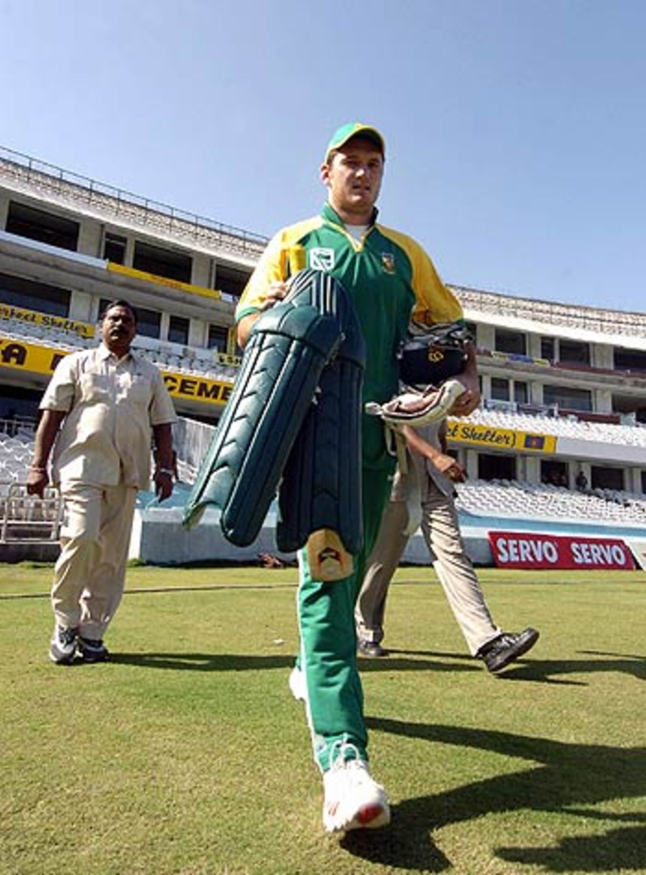 Graeme Smith is escorted onto the field by security guards, Rajiv Gandhi International Stadium, Uppal, Hyderabad, November 15, 2005