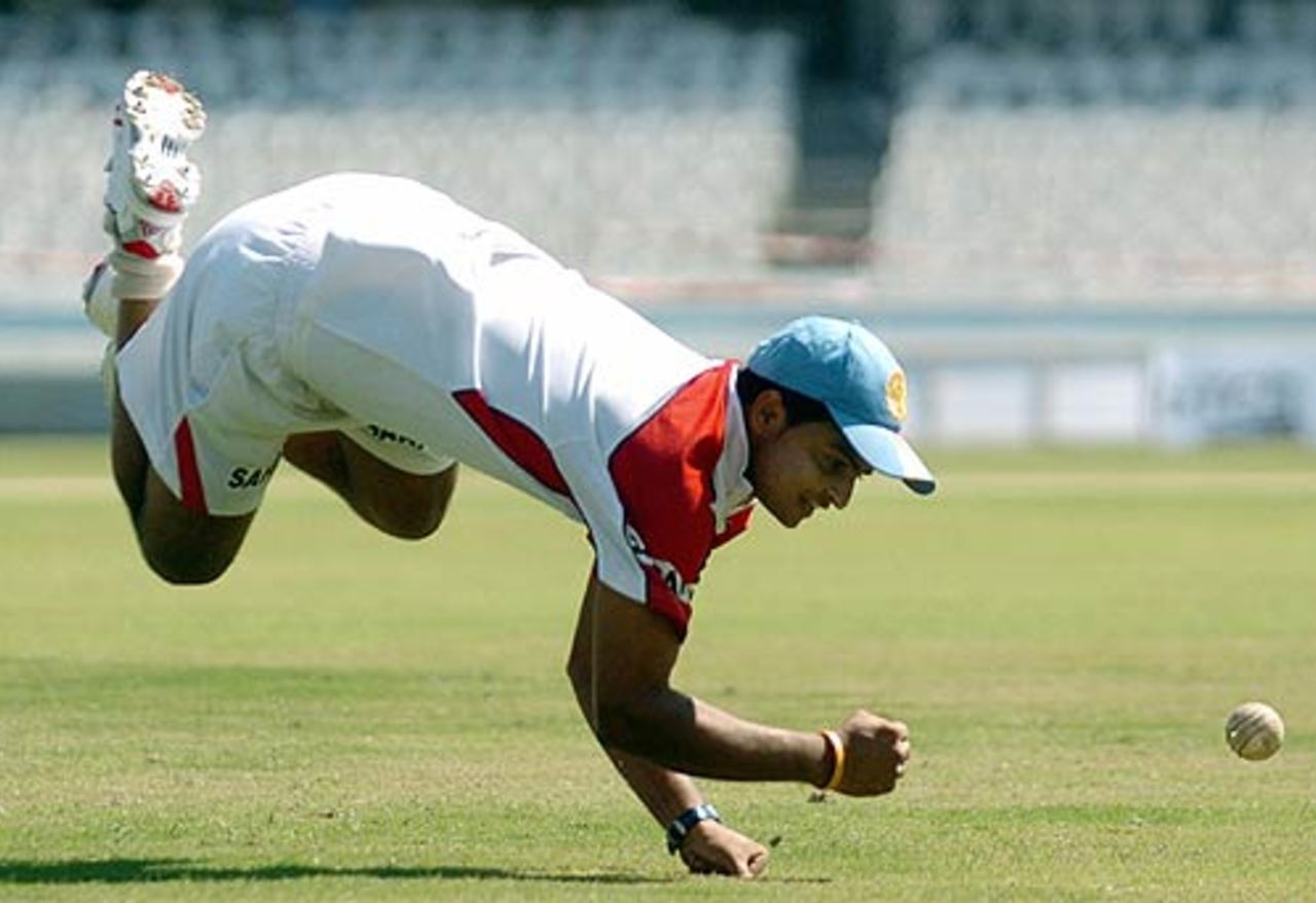 Suresh Raina dives for a ball during a practice session ahead of the 1st ODI against South Africa, Rajiv Gandhi International Stadium, Uppal, Hyderabad, November 15, 2005