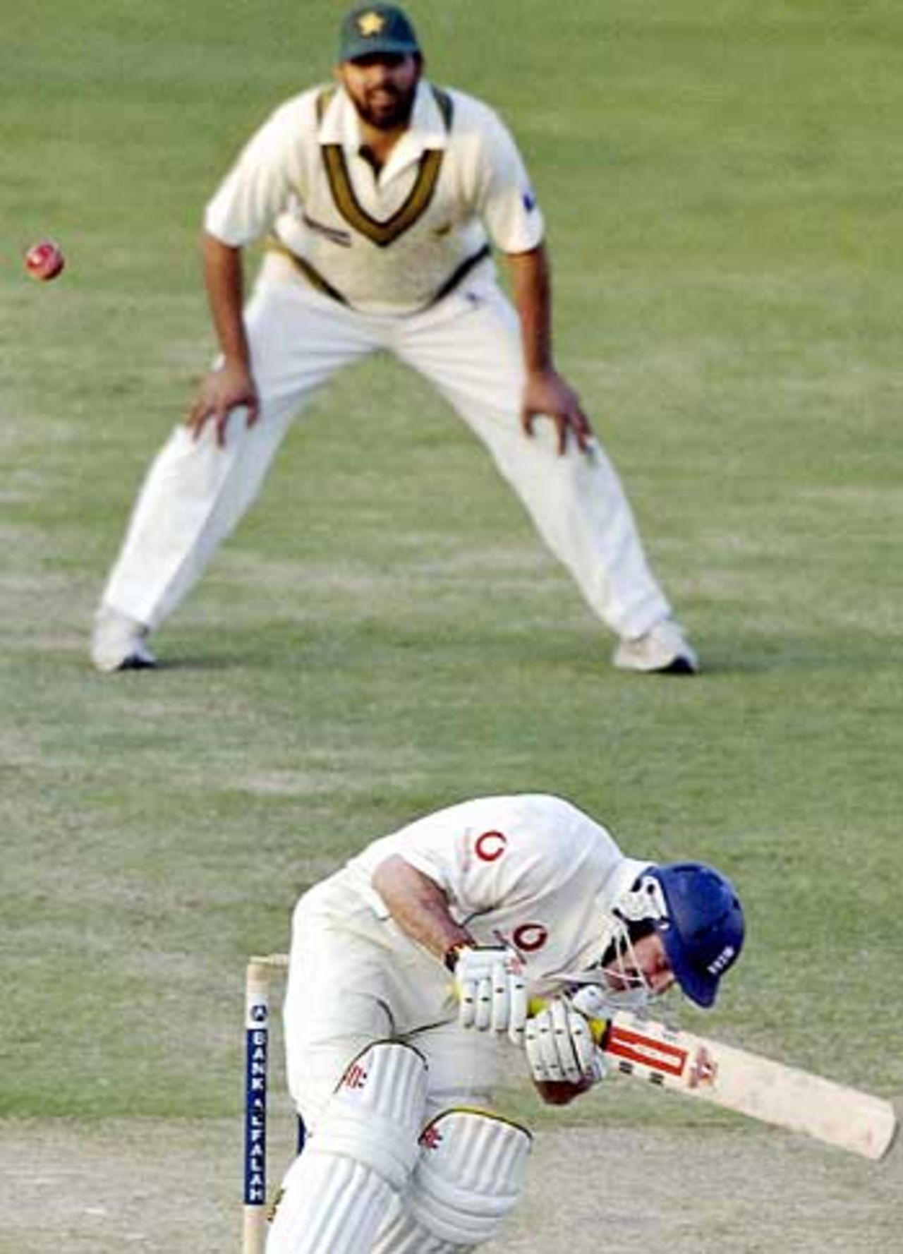 Andrew Strauss ducks under a bouncer, watched by Inzamam-ul-Haq, Pakistan v England, 1st Test, Multan, November 15, 2005