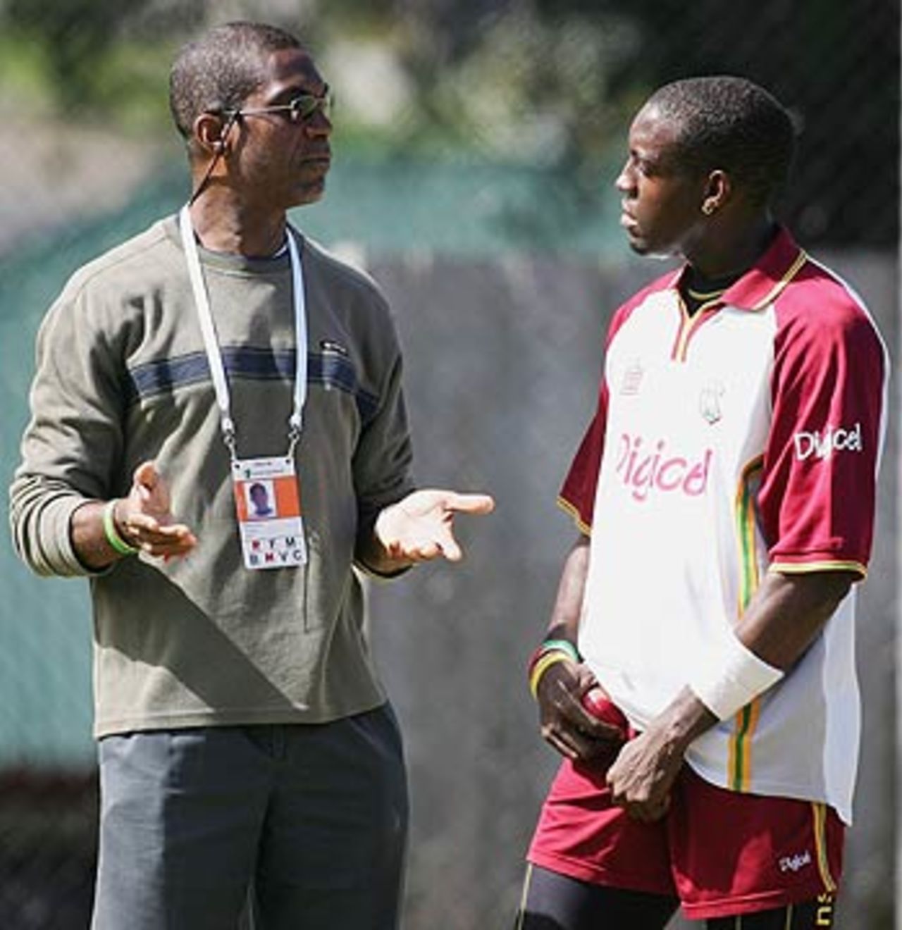 "Now back in my day..." Michael Holding chats with Jermaine Lawson during a practice session, Bellerive Oval, Hobart, November 16, 2005