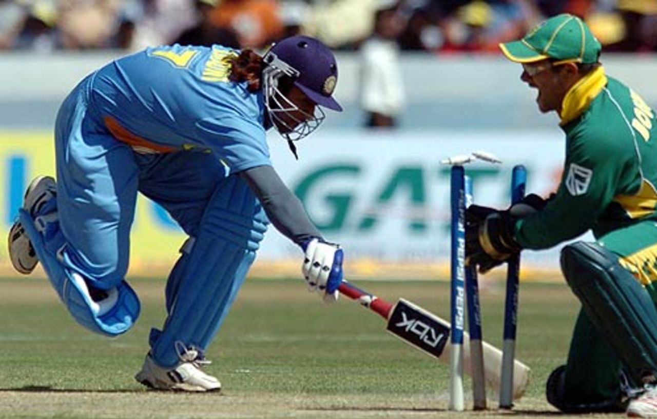 Mahendra Singh Dhoni is run out by a fine throw and some smart work by Mark Boucher, India v South Africa, 1st ODI, Hyderabad, November 16, 2005