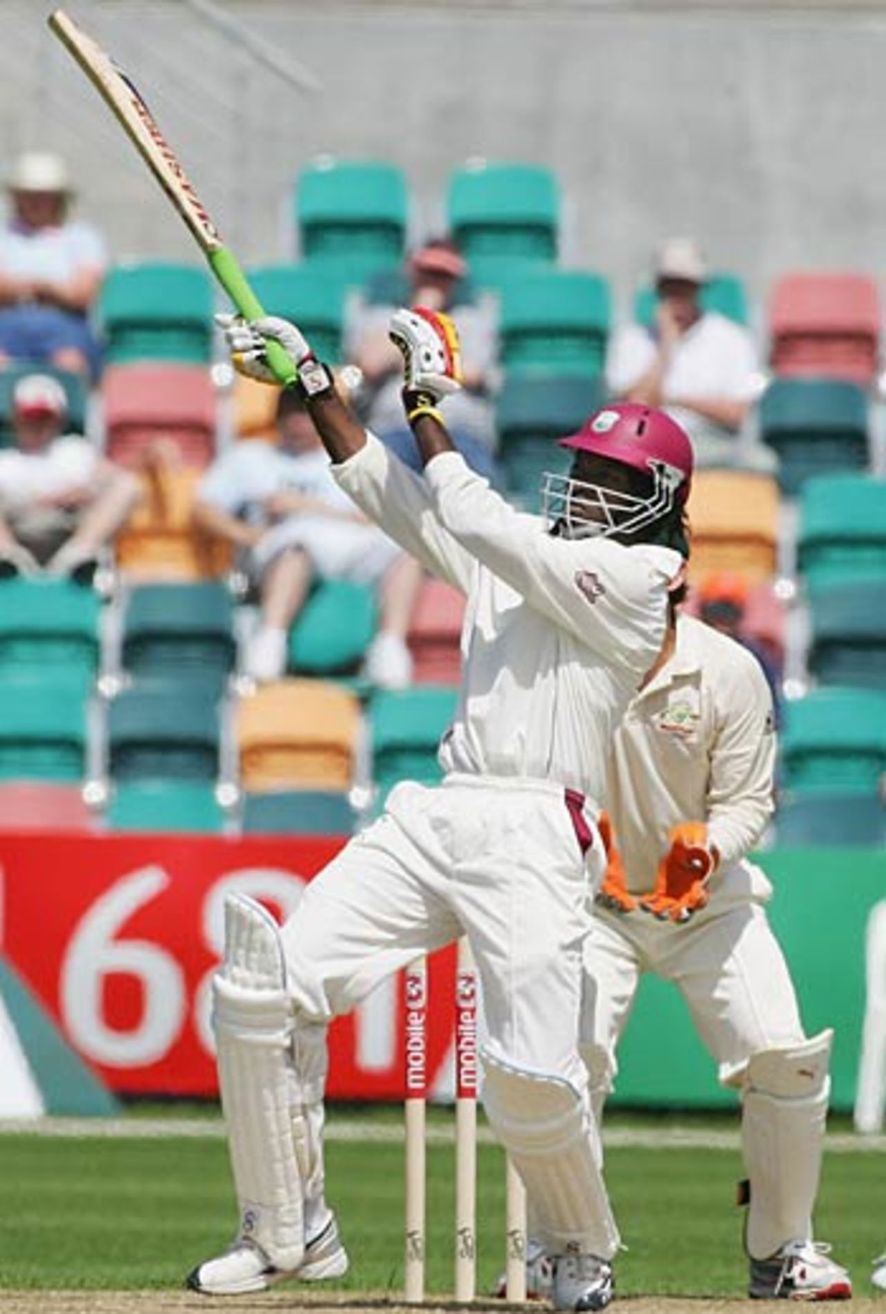 Chris Gayle pulls Shane Warne for a six even as the bottom hand comes off the handle, Australia v West Indies, 2nd Test, Hobart, 1st day, November 17, 2005.