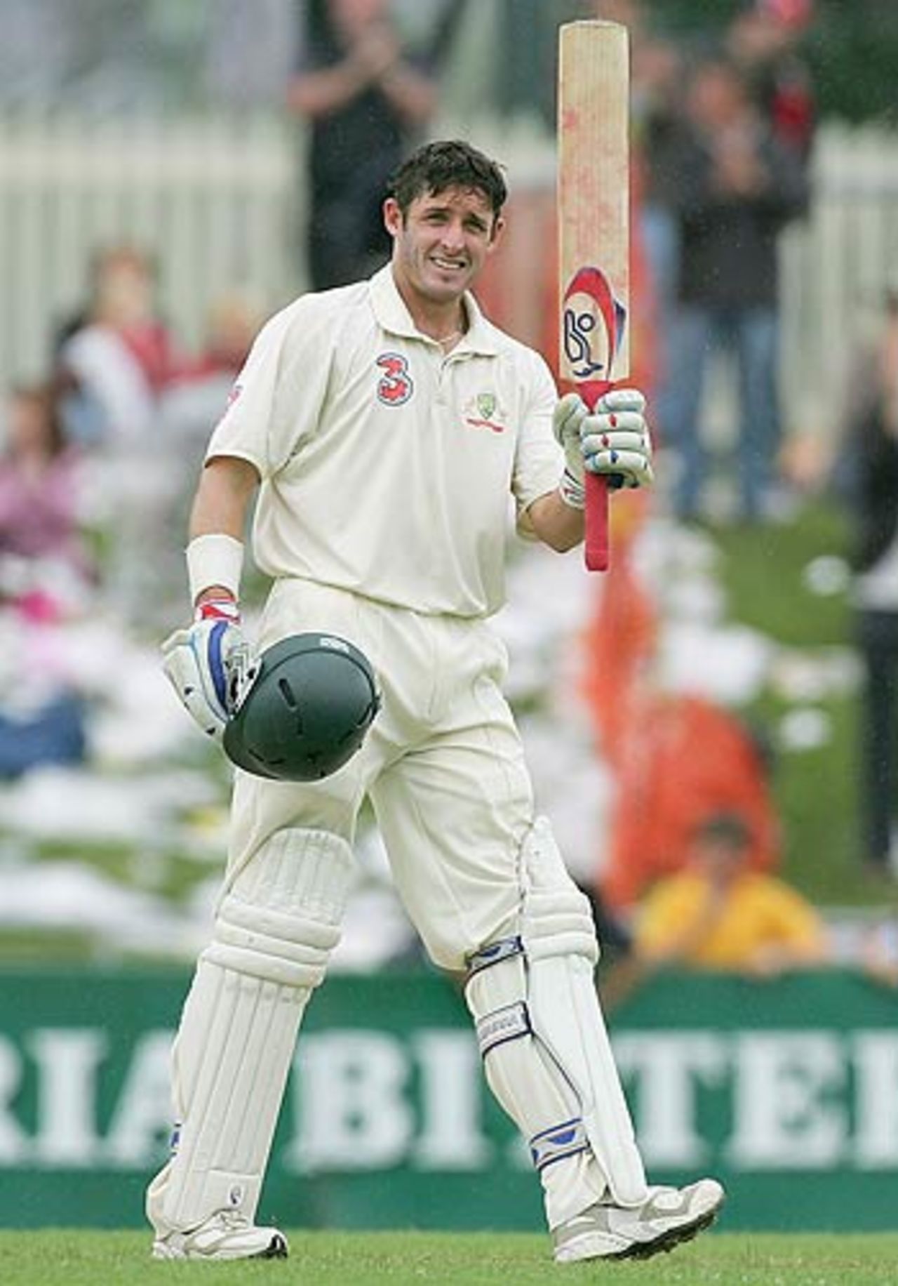 Michael Hussey acknowledges the cheers after reaching his fifty , Australia v West Indies, 2nd Test, Hobart, 2nd day, November 18, 2005