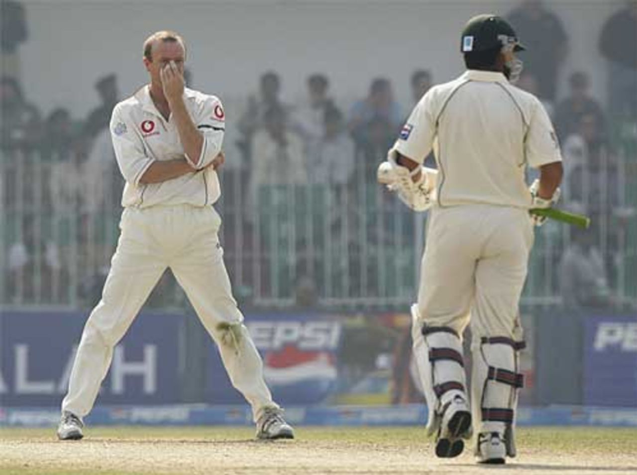 Shaun Udal can only watch as Kamran Akmal smacks another boundary, Pakistan v England, 2nd Test, Faisalabad, November 21, 2005