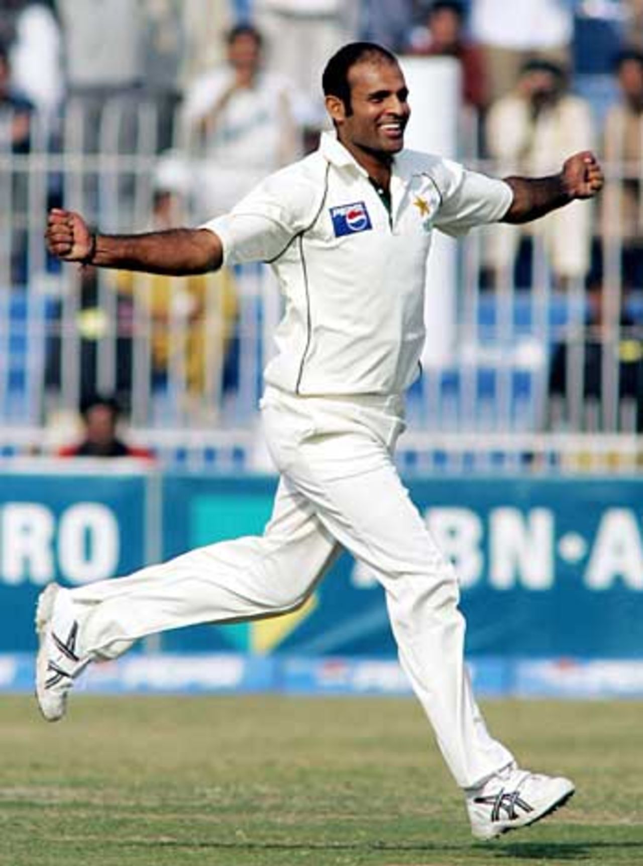 Rana Naved-ul-Hasan celebrates bowling Michael Vaughan. Rana took two early wickets to set England back in their first innings, Pakistan v England, 2nd Test, Faisalabad, November 21, 2005