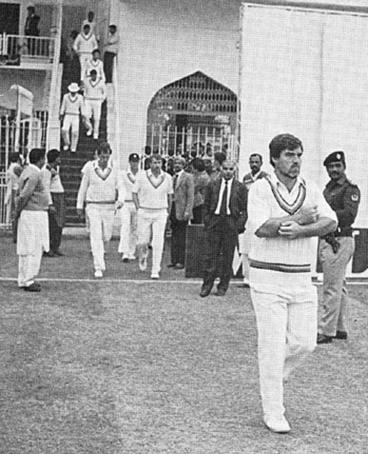 Mike Gatting leads England out for the third day at Faisalabad - but there was to be no play, Pakistan v England, 2nd Test, Faisalsbad, December 9, 1987