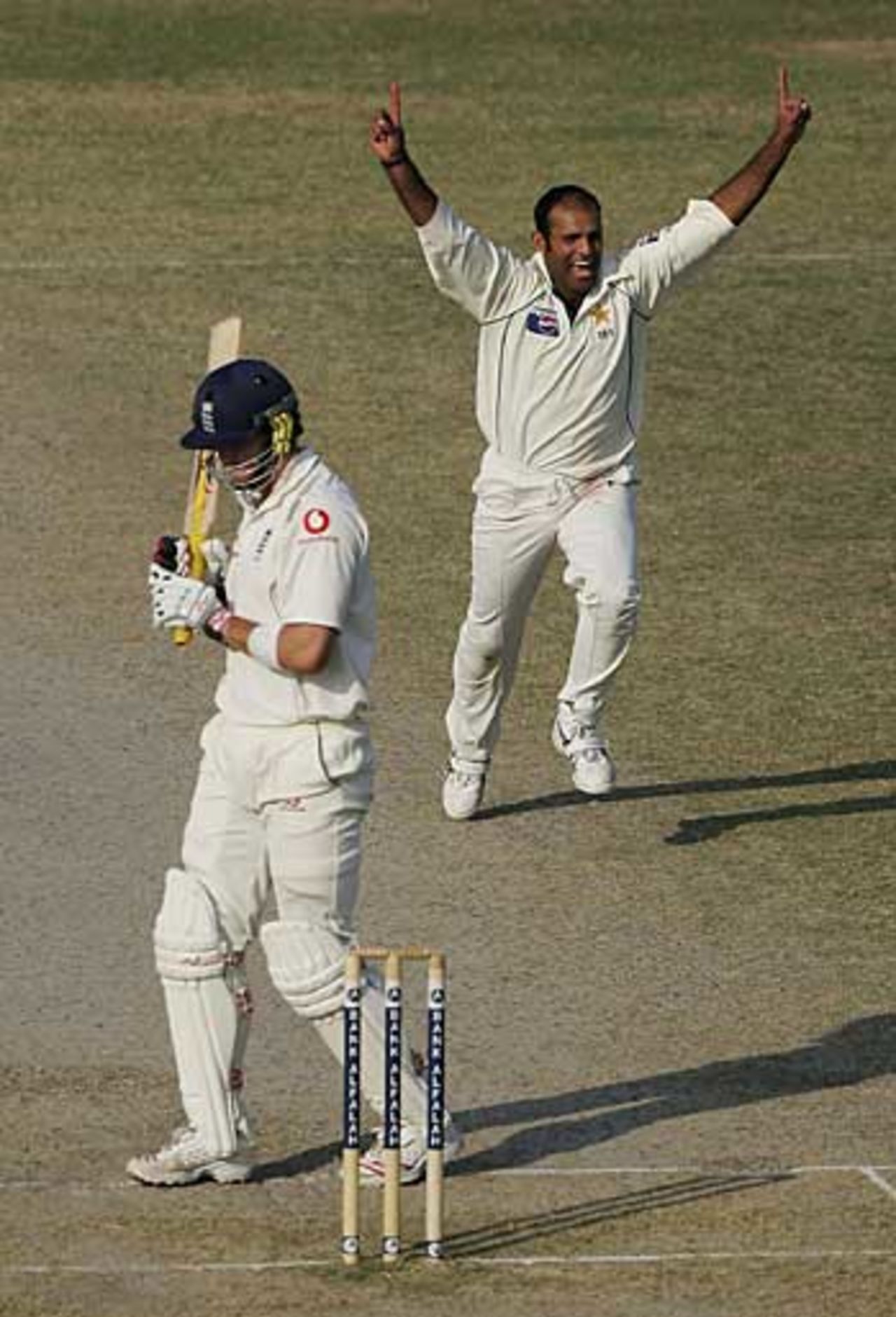 Kevin Pietersen makes his way back to the pavilion to the delight of Rana Naved-ul-Hasan, Pakistan v England, 2nd Test, Faisalabad, November 24, 2005
