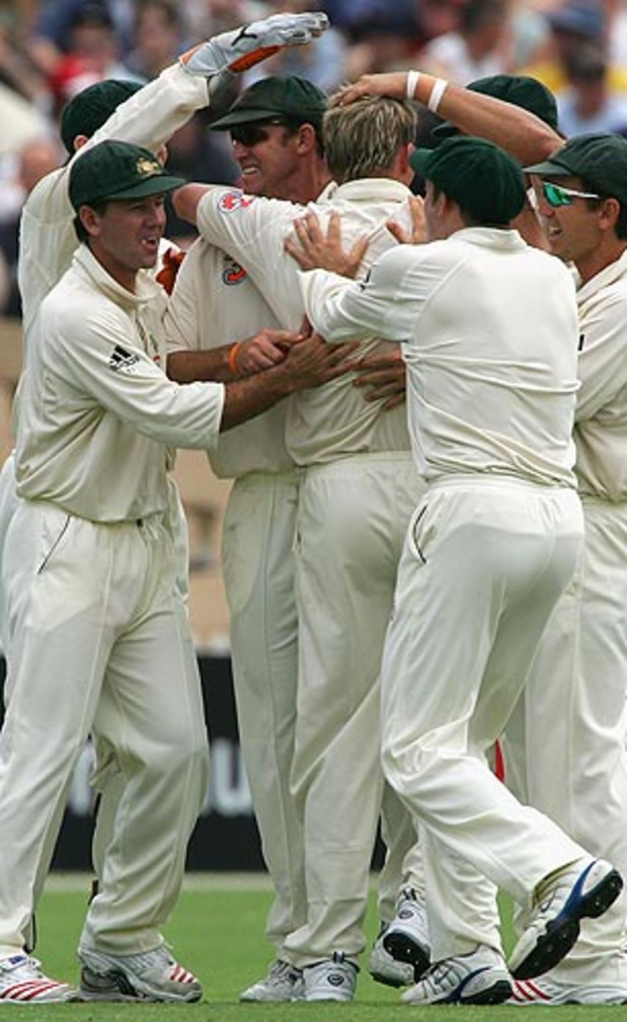 Brett Lee removes Devon Smith and is swamped by teammates, Australia v West Indies, 3rd Test, Adelaide, 1st day. November 25, 2005