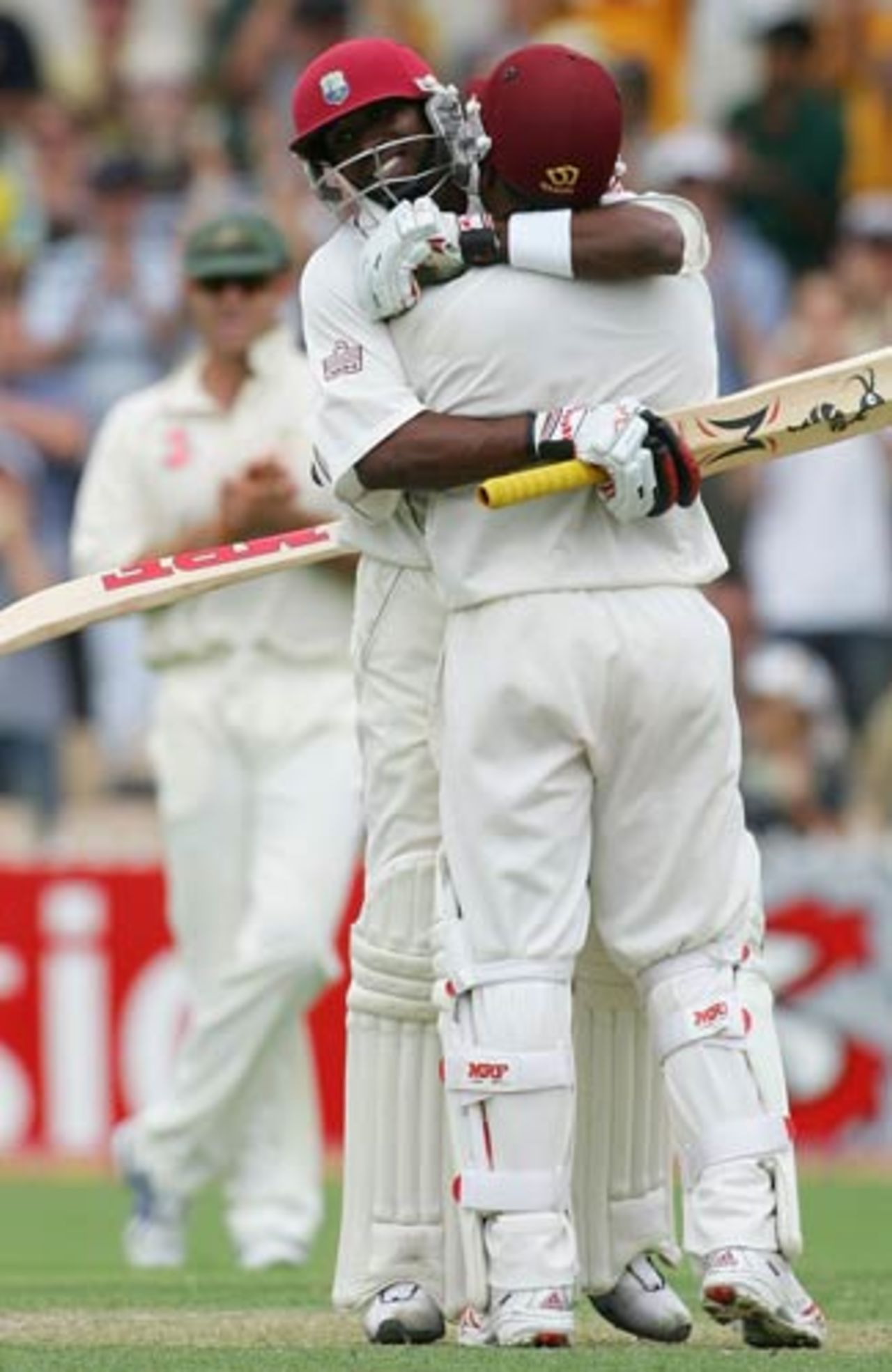 Brian Lara celebrates his century - and return to form - with Dwayne Bravo, Australia v West Indies, 3rd Test, Adelaide, 1st day, November 25, 2005
