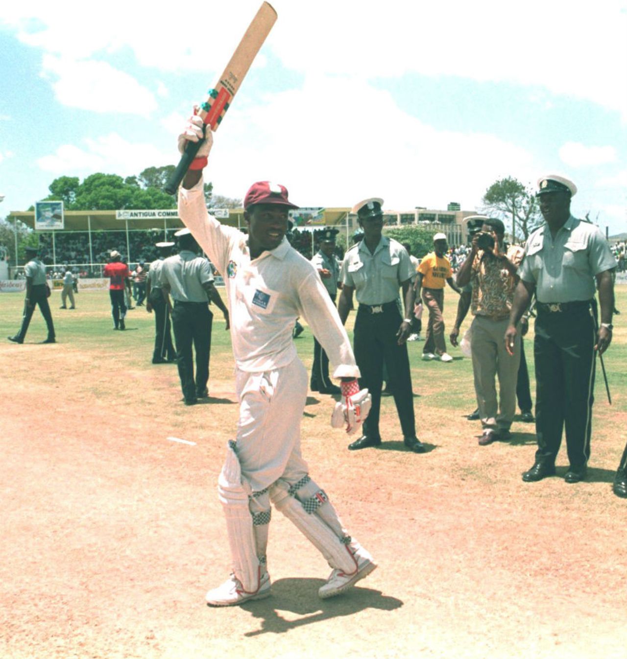 Brian Lara is swamped by security guards after breaking Gary Sobers' world record, West Indies v England, 5th Test, St John's, Antigua, April 18, 1994