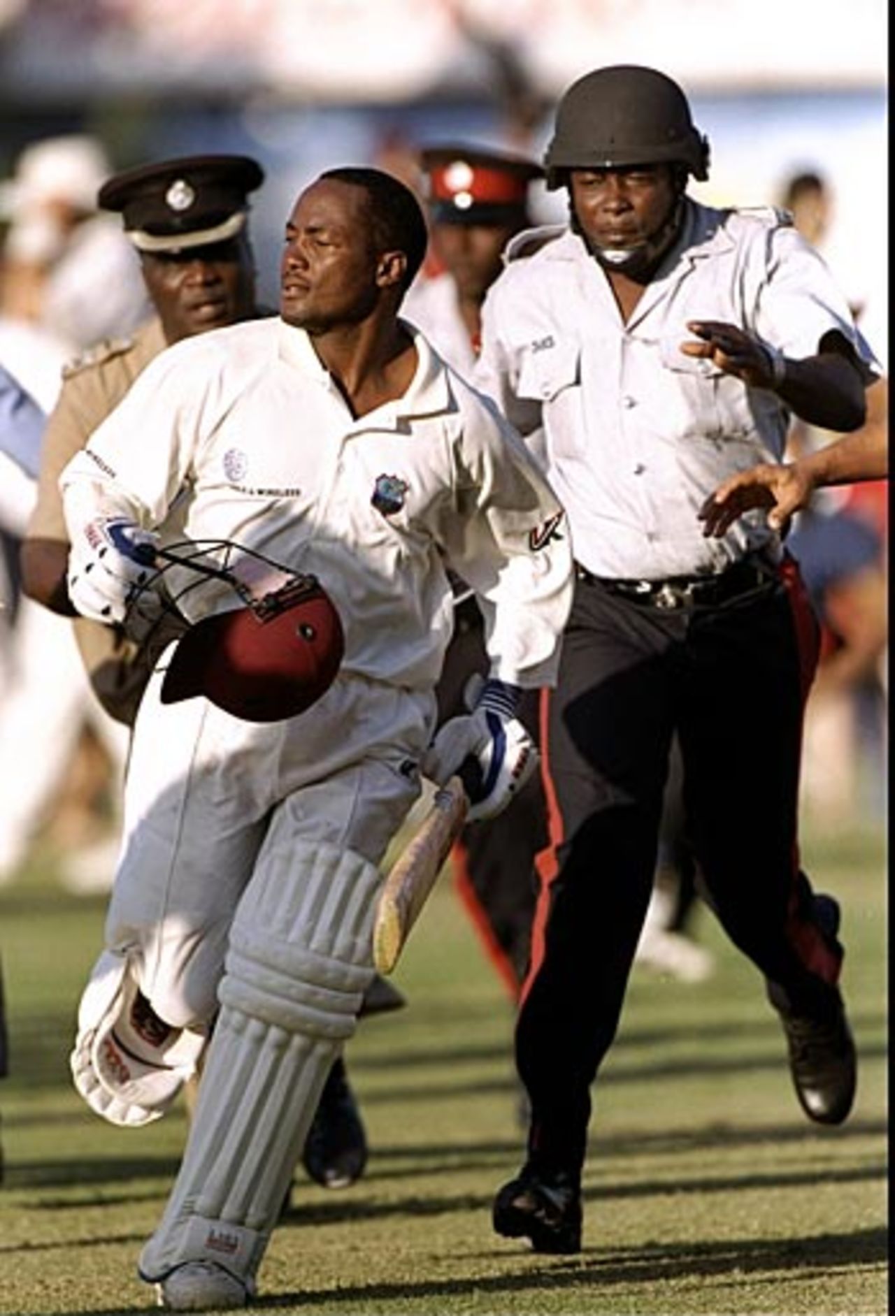 Brian Lara runs off the pitch after scoring 213 against Australia, West Indies v Australia, Jamaica, 14 March, 1999