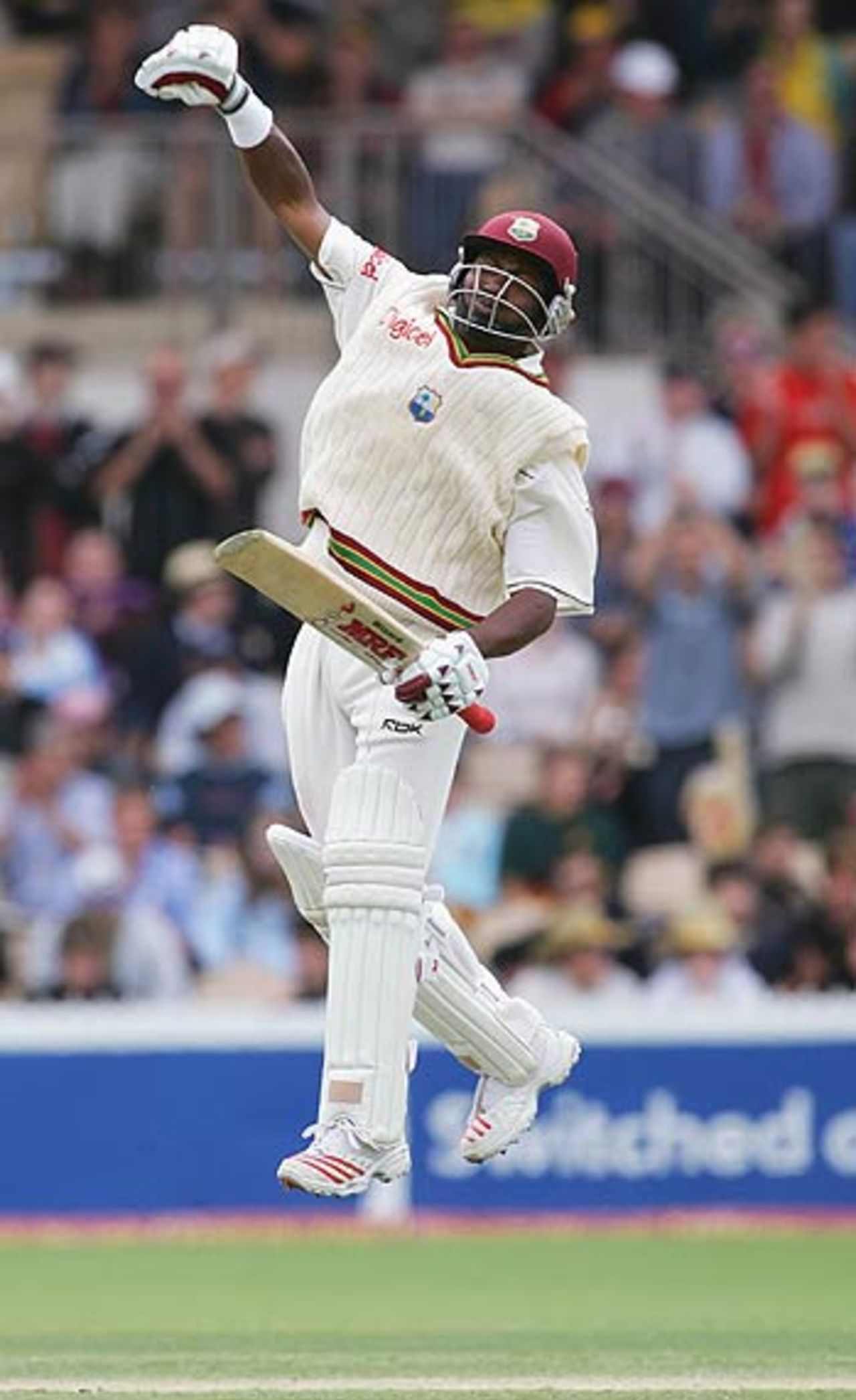 Brian Lara celebrates after breaking Allan Border's record of 11,174 Test runs, Australia v West Indies, 3rd Test, Adelaide, 2nd day, November 26, 2005
