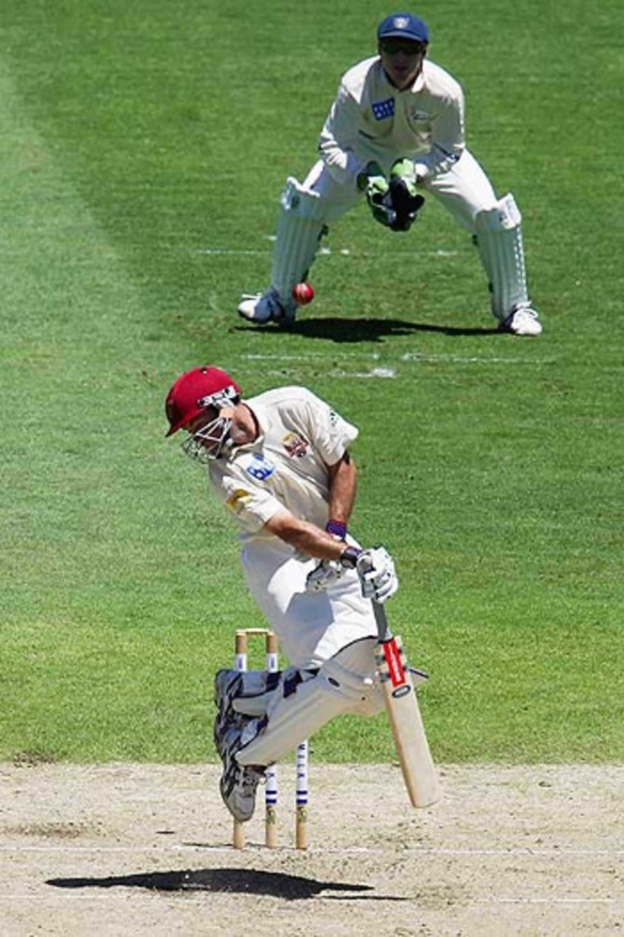 White men <i>can</i> jump, proves Jimmy Maher, as he just manages to avoid this bouncer, New South Wales v Queensland, Pura Cup, Syndey, November 26, 2005