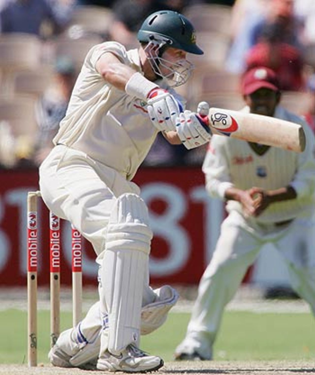 Michael Hussey drives during his second Test century, Australia v West Indies, 3rd Test, Adelaide, 3rd day, November 27, 2005