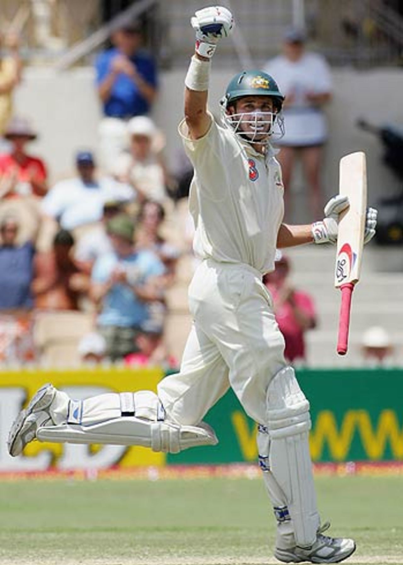 Michael Hussey celebrates hitting the winning runs as Australian win the series 3-0, 3rd Test, Adelaide, 5th day, November 29, 2005