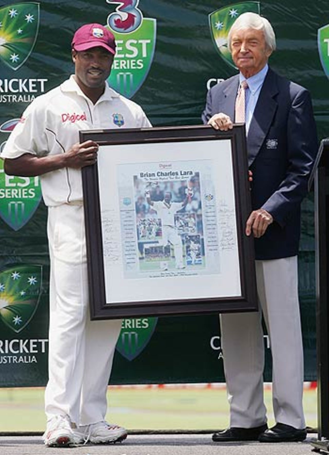 Brian Lara is presented with a photograph commemorating his world record Test run tally by Richie Benaud, 3rd Test, Adelaide, 5th day, November 29, 2005