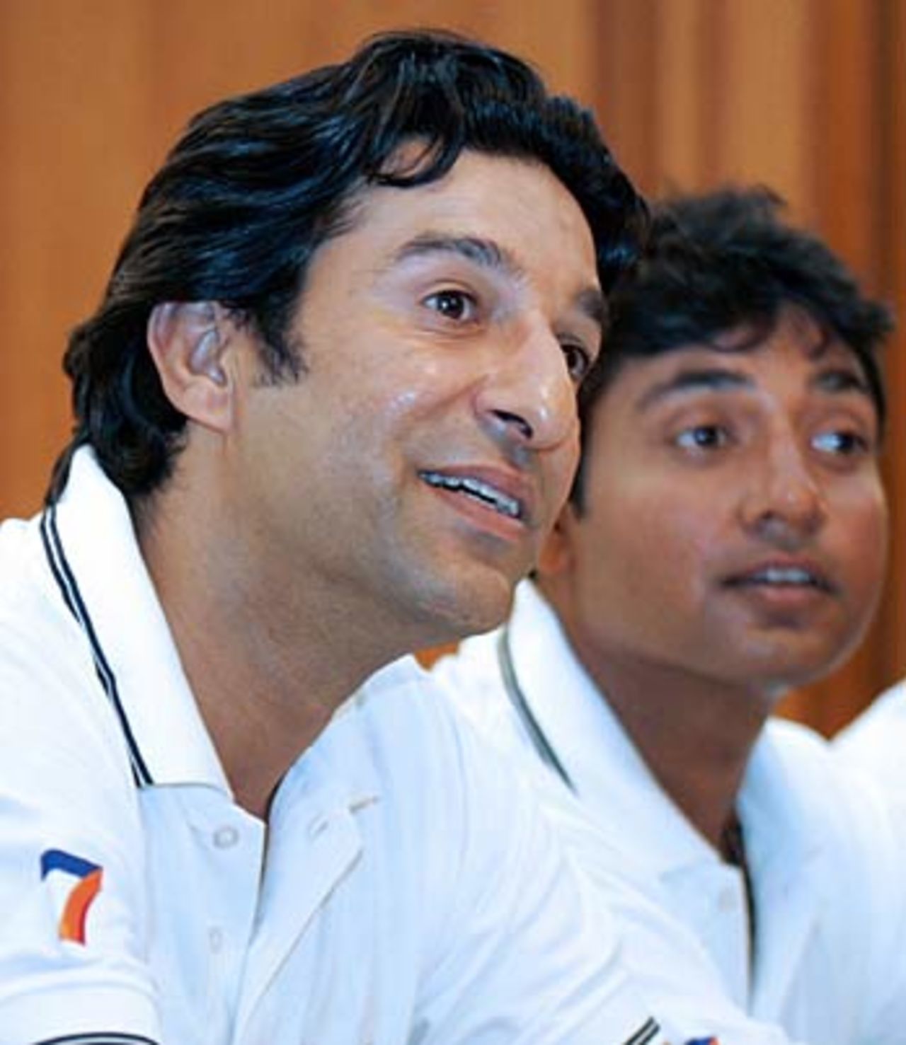 Wasim Akram and Ajay Jadeja take questions at the announcement of India's first reality cricket TV series "Scorpio Speedster 2005" in Mumbai, November 29, 2005