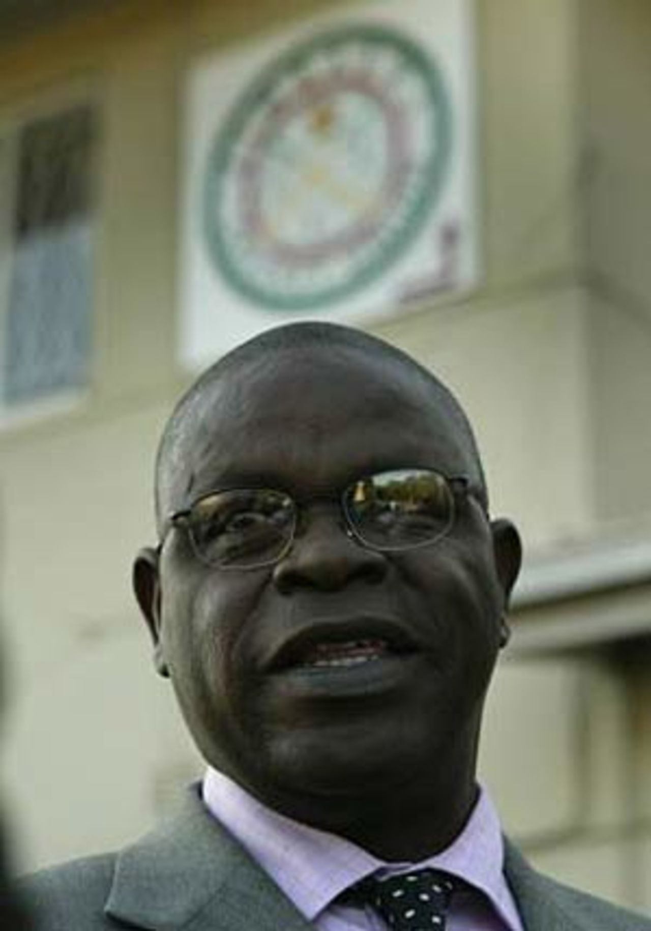 Peter Chingoka outside the offices of the Zimbabwe Cricket Union, September 2003