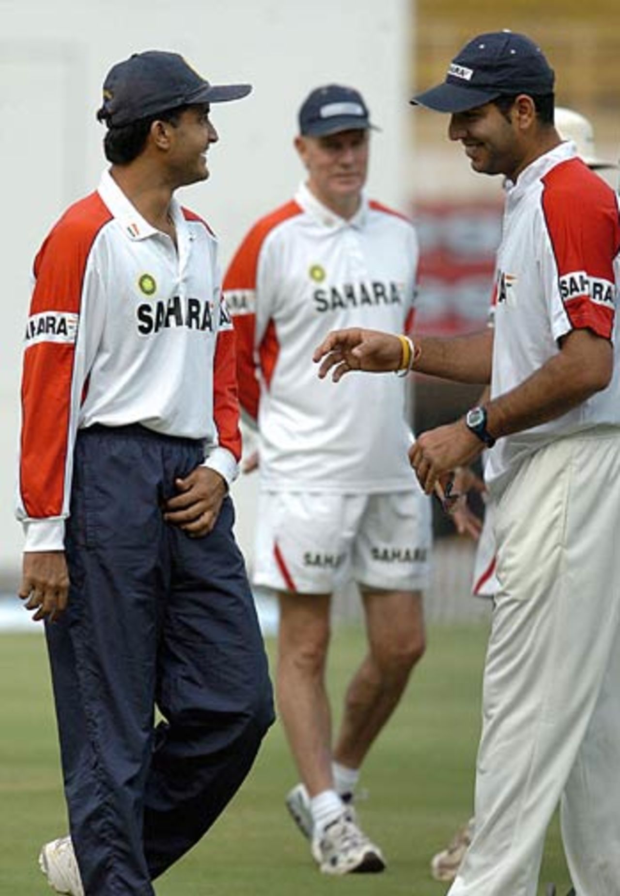Sourav Ganguly shares a lighter moment with Yuvraj Singh as Greg Chappell looks on, Chennai, November 30, 2005