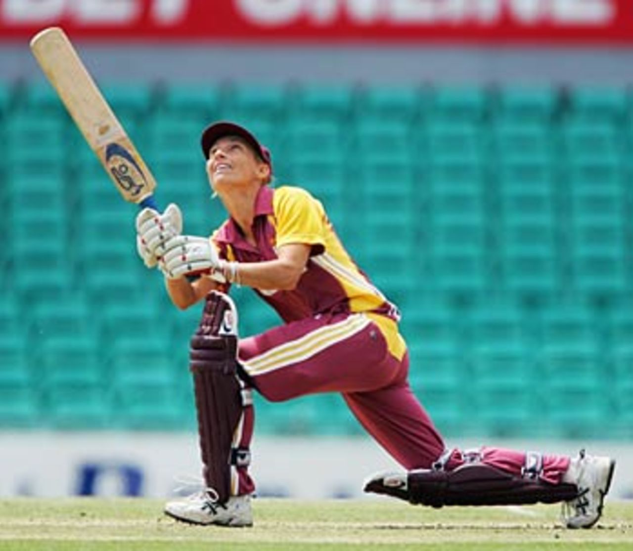 Julia Price of Queenland hoicks it to the on side, New South Wales v Queensland, Sydney, December 3, 2005