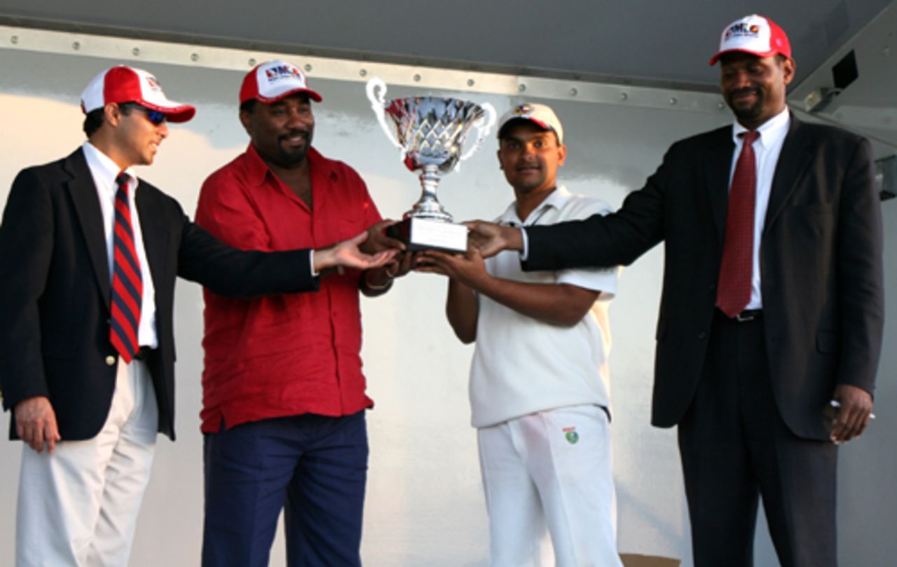 Texas captain Niraj Shah receives the Clive H Lloyd National Interstate Cricket Tournament Champion's Trophy, Florida, December 4, 2005 