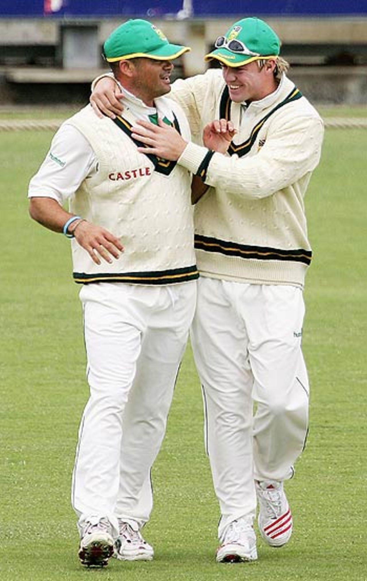 Charl Langeveldt and AB de Villies share a light moment on the boundary, Western Australia v South Africa, WACA, Perth, December 5, 2005
