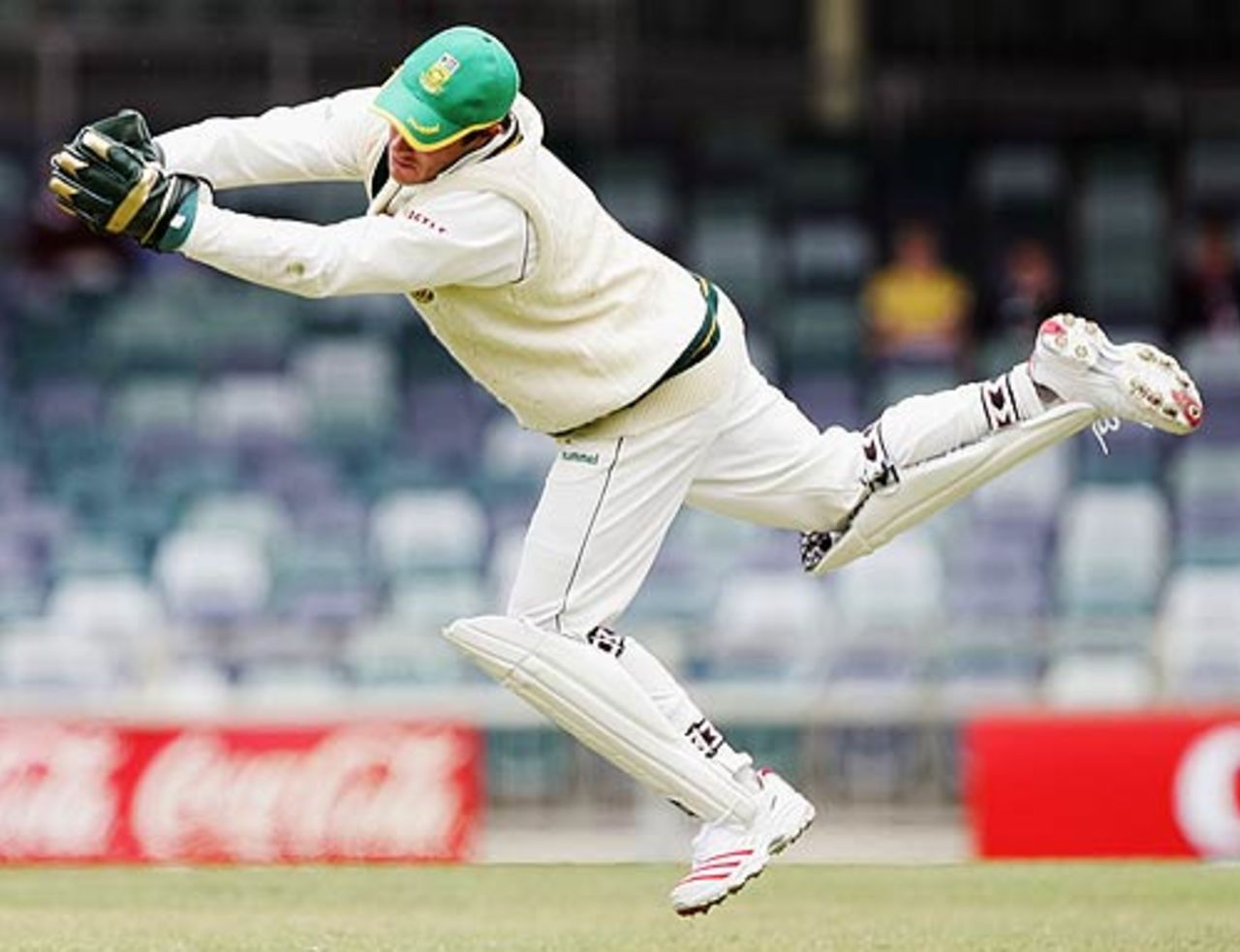 An acrobatic Mark Boucher behind the stumps, Western Australia v South Africa, WACA, Perth, December 5, 2005