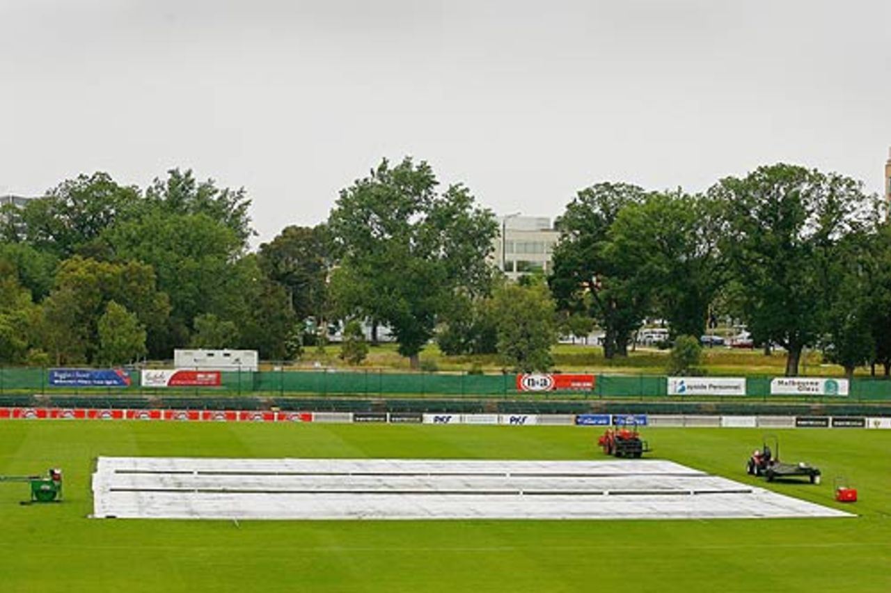 Covers stay on the pitch as play is abandoned due to persistant rain in Melbourne , Victoria v New South Wales, Pura Cup, Melbourne (St Kilda), December 6, 2005
