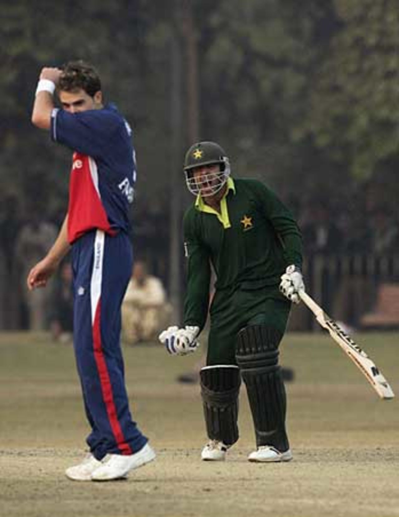 Bazid Khan pumps the air after hitting the winning runs as James Anderson can't stop him despite four wickets, Pakistan A v England XI, Tour match, Lahore, December 7, 2005