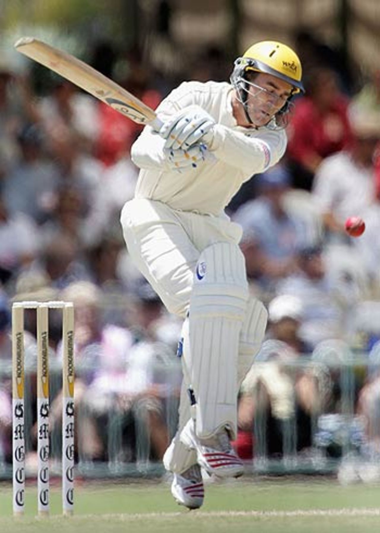 Justin Langer feels the heat during the tour match against the South Africans, Cricket Australia Chairman's XI v South Africans, Lilac Hill, Perth, December 9, 2005