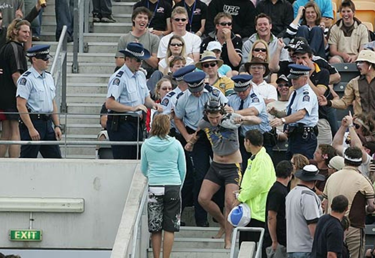 Security guards escort a misbehaving fan away, New Zealand v Australia, 3rd ODI, Christchurch, December 10, 2005