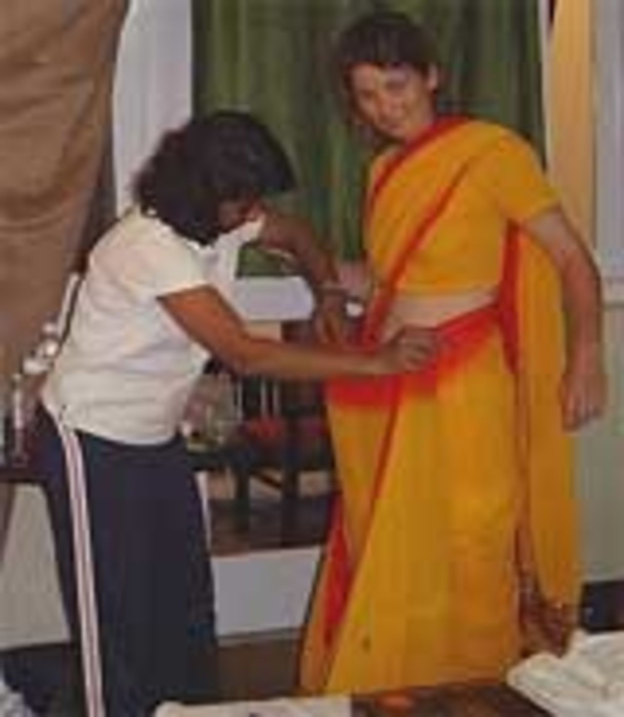 Charlotte Edwards is fitted for a sari, England women in India, December 10, 2005