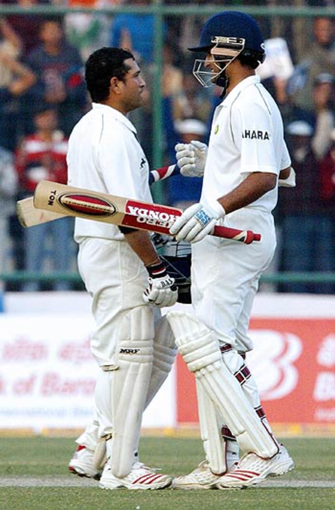 Sourav Ganguly congratulates Sachin Tendulkar after Tendulkar reached  his 35th Test century, India v Sri Lanka, Delhi, December 10, 2005