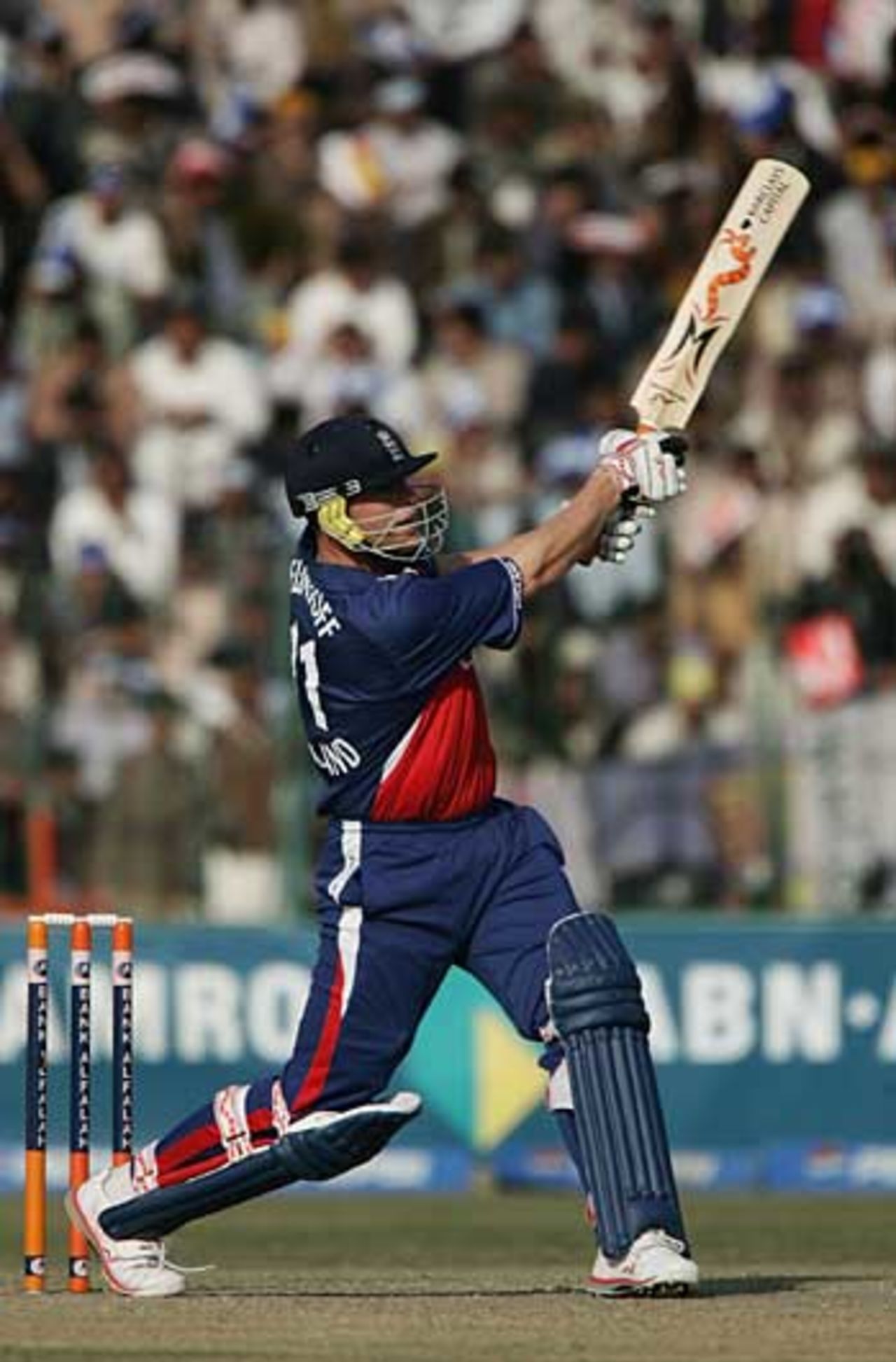 Andrew Flintoff launches another ball to boundary during is late assault on the Pakistan attack, Pakistan v England, 1st ODI, Lahore, December 10, 2005