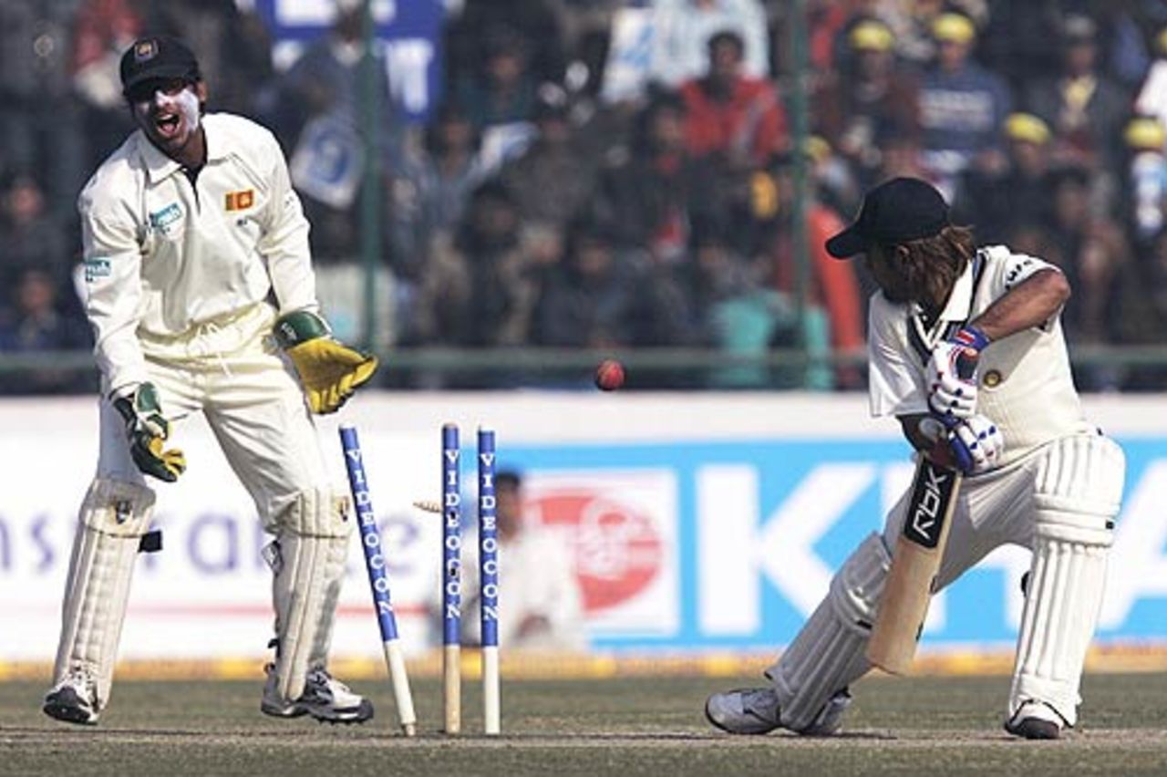 Mahendra Singh Dhoni was beaten by an unplayable legbreak from Muttiah Muralitharan, India v Sri Lanka, Delhi, December 11, 2005