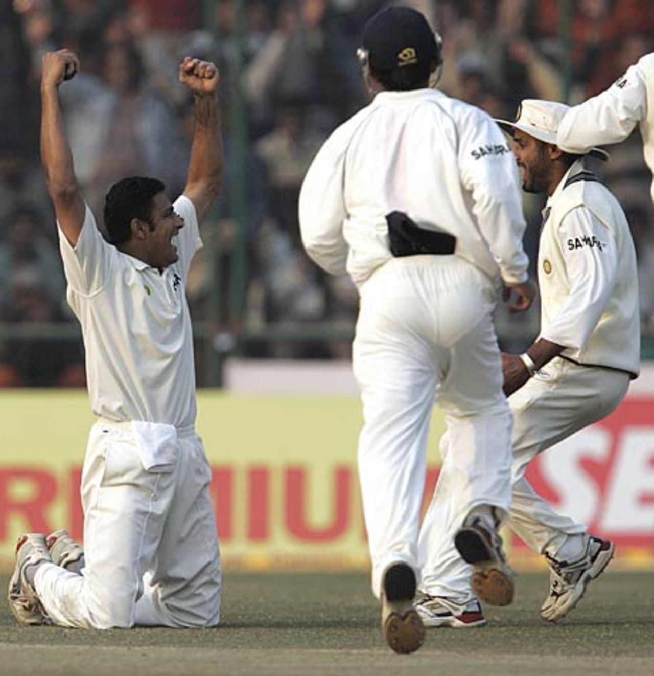Kumble celebrates after taking an excellent low catch of his own bowling  to dismiss Marvan Atapattu, India v Sri Lanka, 2nd Test, Delhi, December 13, 2005
