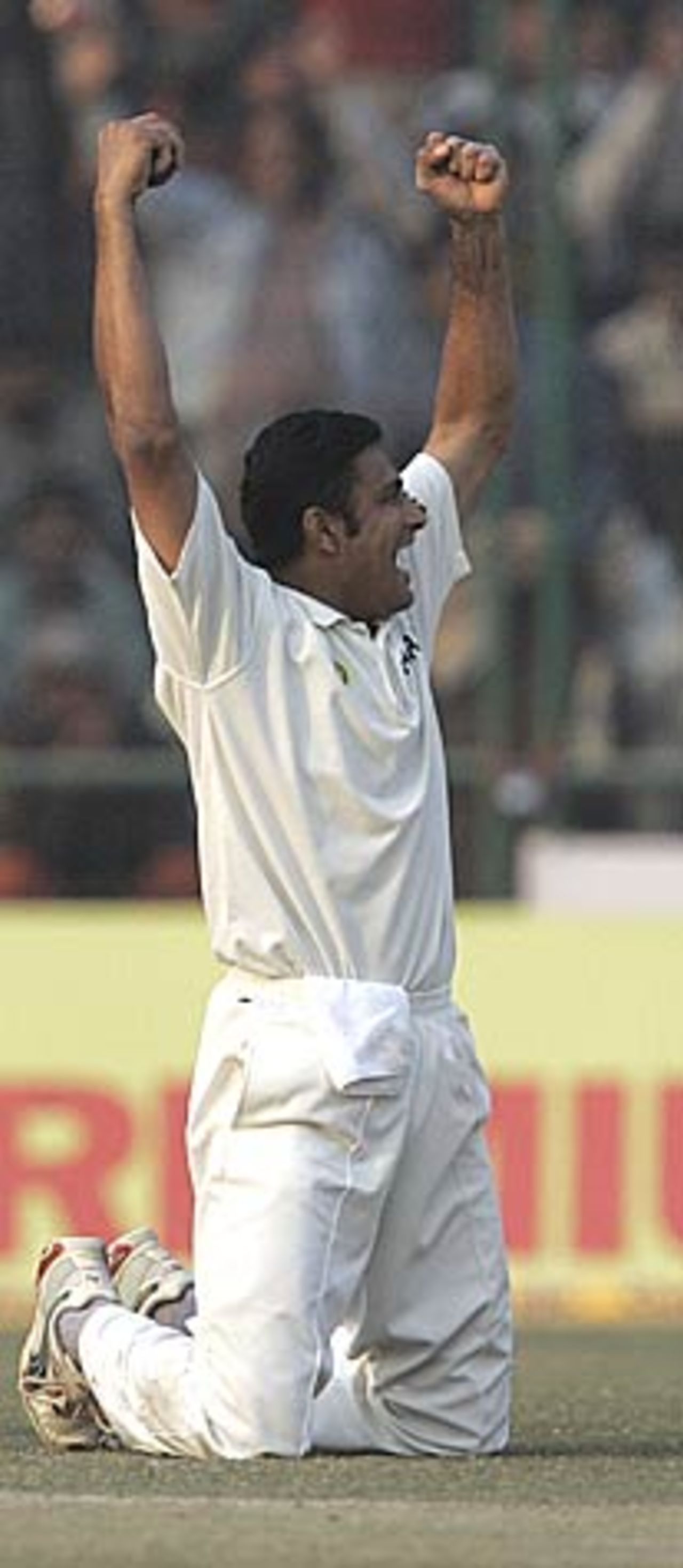 Kumble celebrates after taking an excellent low catch of his own bowling  to dismiss Marvan Atapattu, India v Sri Lanka, 2nd Test, Delhi, 3rd day, December 13, 2005