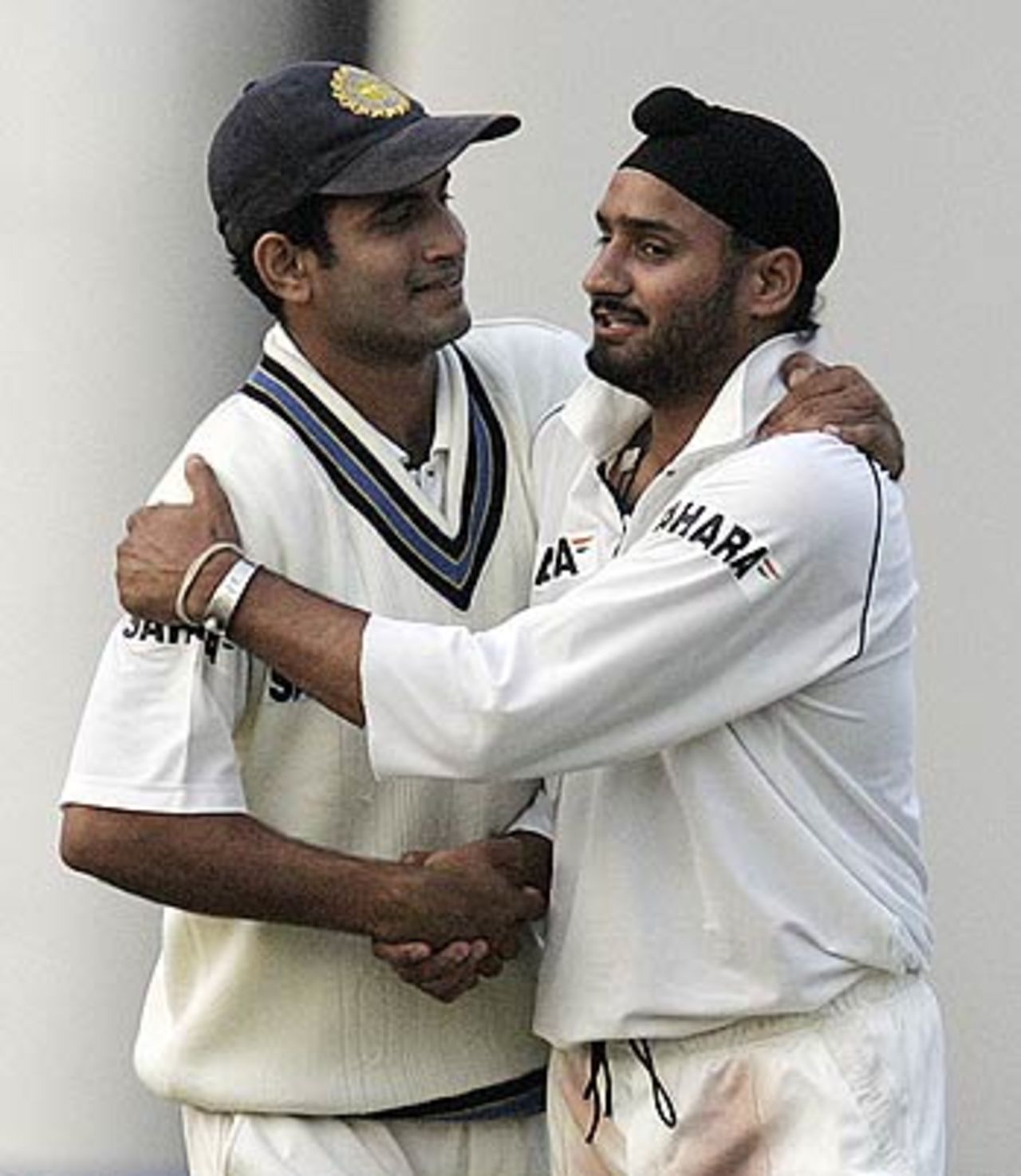 Irfan Pathan congratulates Harbhajan Singh on the wicket of Thilan Samaraweera, India v Sri Lanka, 2nd Test, Delhi, 3rd day, December 13, 2005