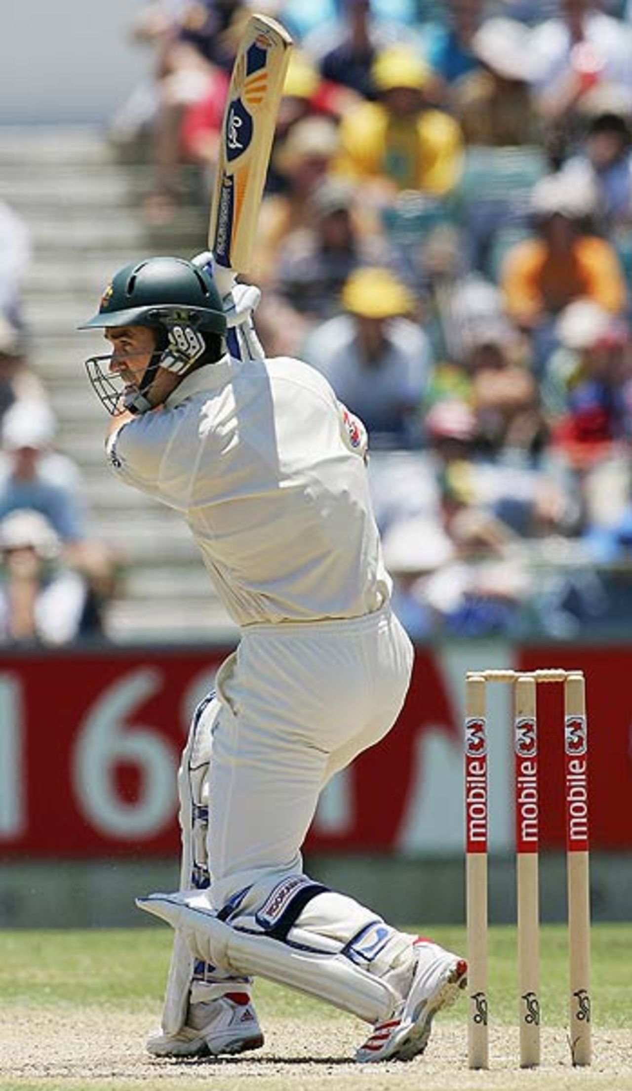 Justin Langer eases one through cover, Australia v South Africa, 1st Test, Perth, 3rd day, December 18, 2005
