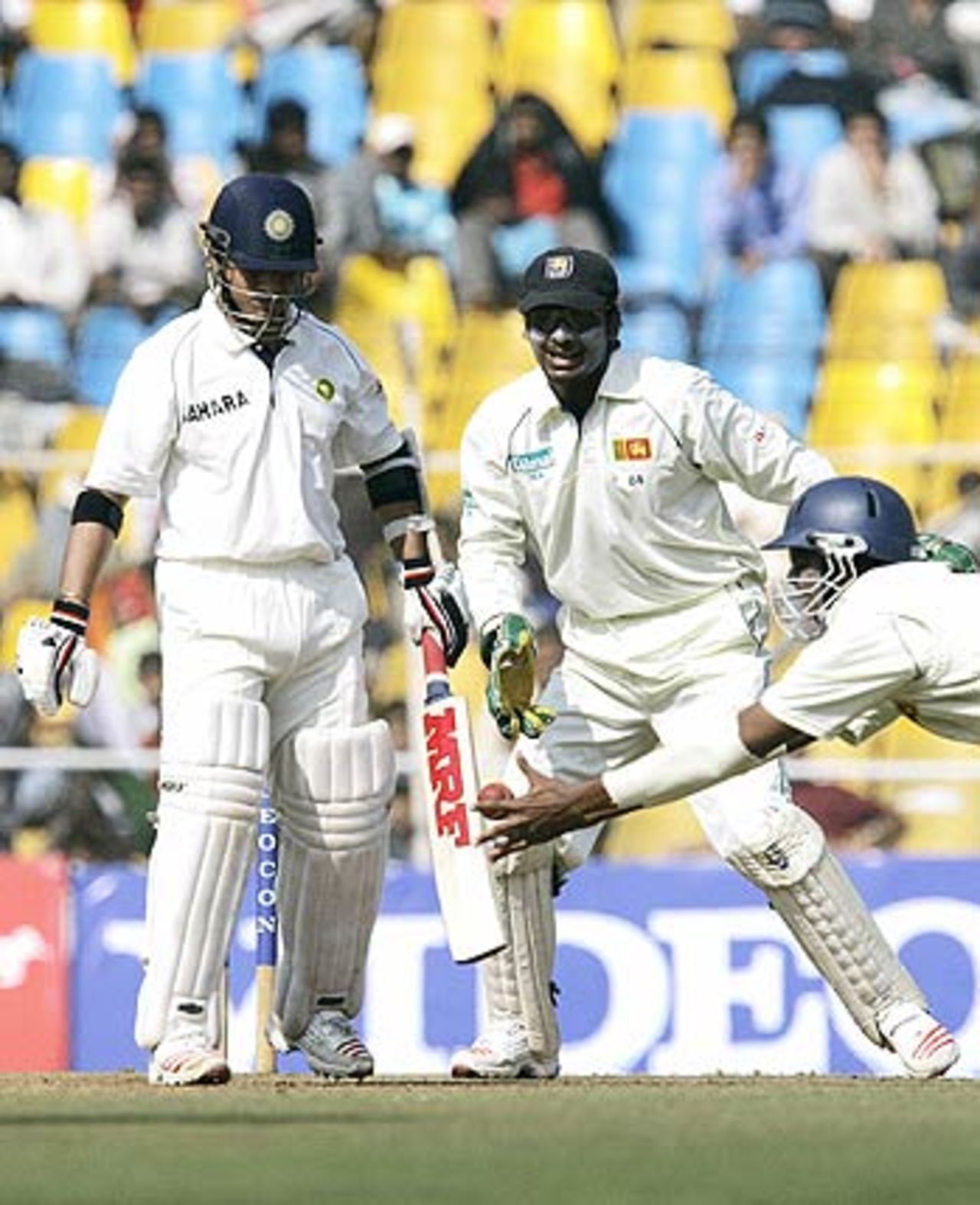 Sachin Tendulkar watches Jehan Mubarak take his catch at short leg, India v Sri Lanka, 3rd Test, Ahmedabad, 1st day, December 18, 2005