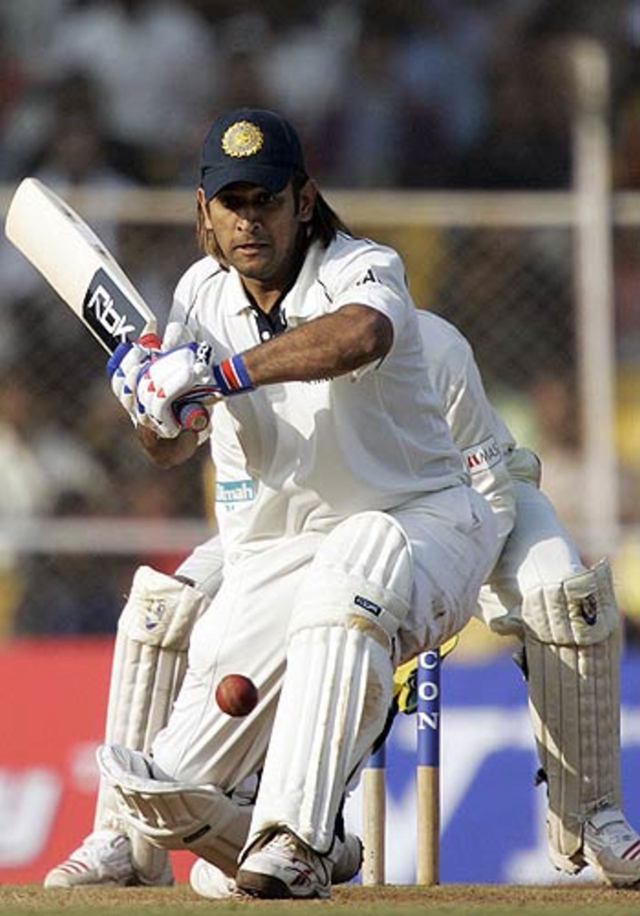 Mahendra Singh Dhoni lines up to sweep, India v Sri Lanka, 3rd Test, Ahmedabad, 1st day, December 18, 2005