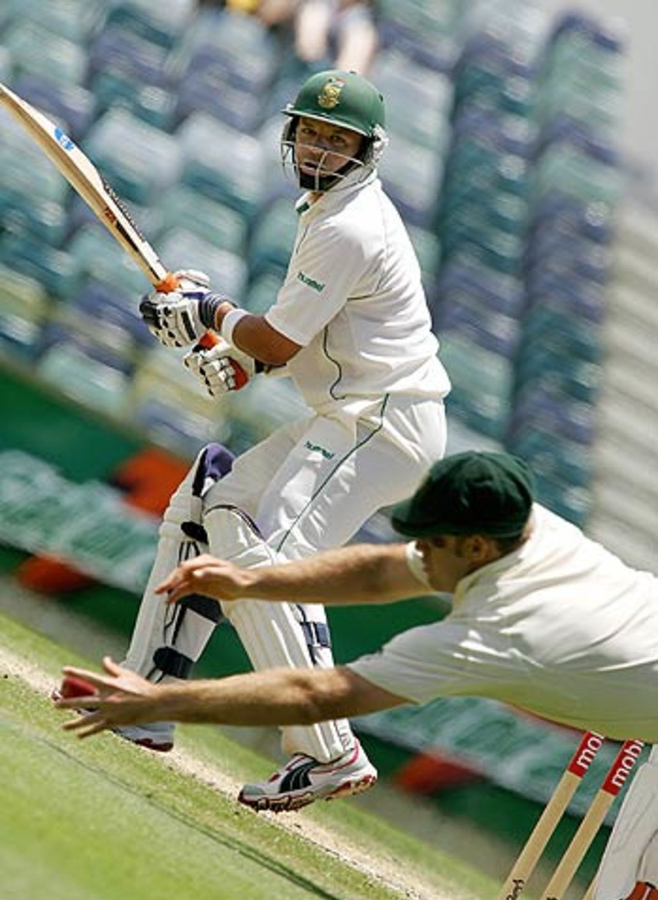Ashwell Prince watches as Matthew Hayden stretches for a catch , Australia v South Africa, 1st Test, Perth, 4th day, December 20, 2005
