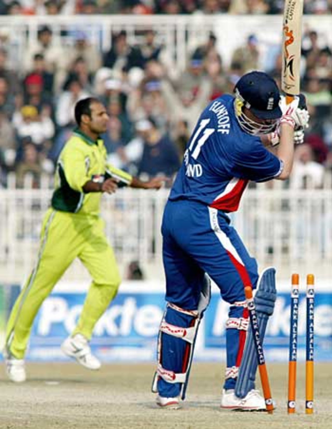 Andrew Flintoff aims a swipe at the stumps after being bowled by Rana Naved-ul-Hasan, Pakistan v England, 5th ODI, Rawalpindi, December 21, 2005
